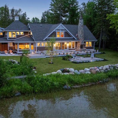 Michigan lake house Rear exterior evening