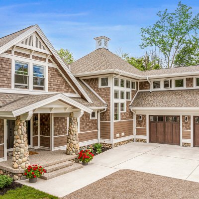 Exterior view: front entry, hinge and garage