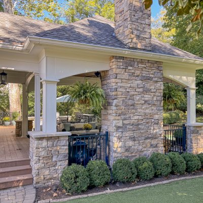 outdoor living covered patio with fireplace